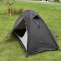 Single person hiking tent with aluminium poles in red colour, shown fully pitched with ventilation mesh visible.