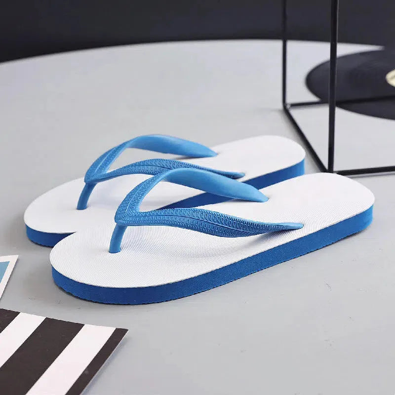 Deodorant rubber beach flip-flops with fish label design in black, blue, green, and red colour options