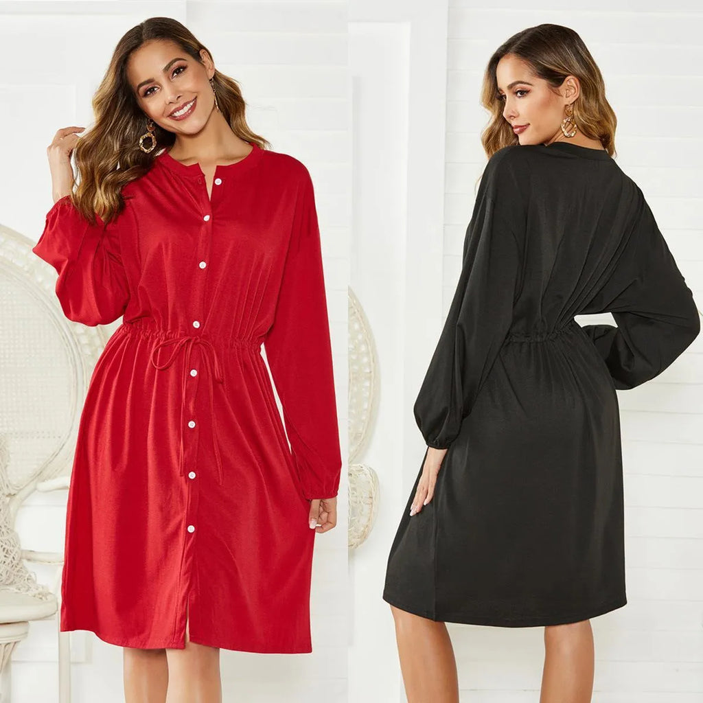 Women's loose elastic belt cinched short dress in solid black or red polyester with long sleeves and A-line skirt