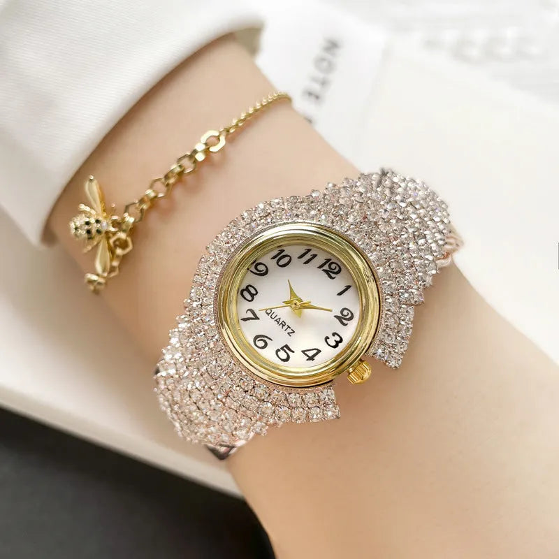 Women's 33mm quartz watch with circular dial, metal case, alloy strap, and open buckle