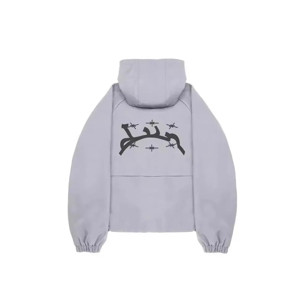 Grey loose-fit men's hooded jacket in British style on a hanger