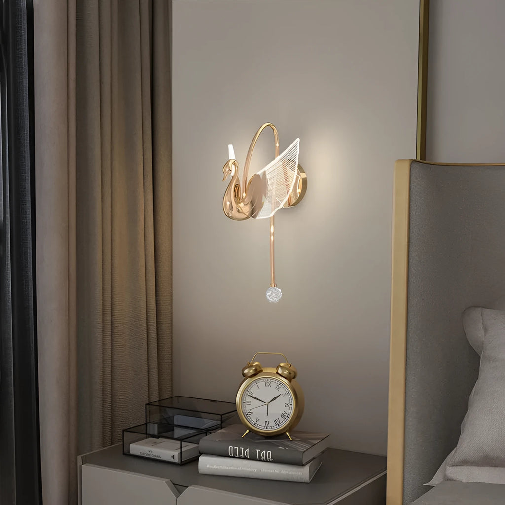 Modern gold swan-shaped wall lamp with acrylic shade and dimmable multi-colour LED lighting
