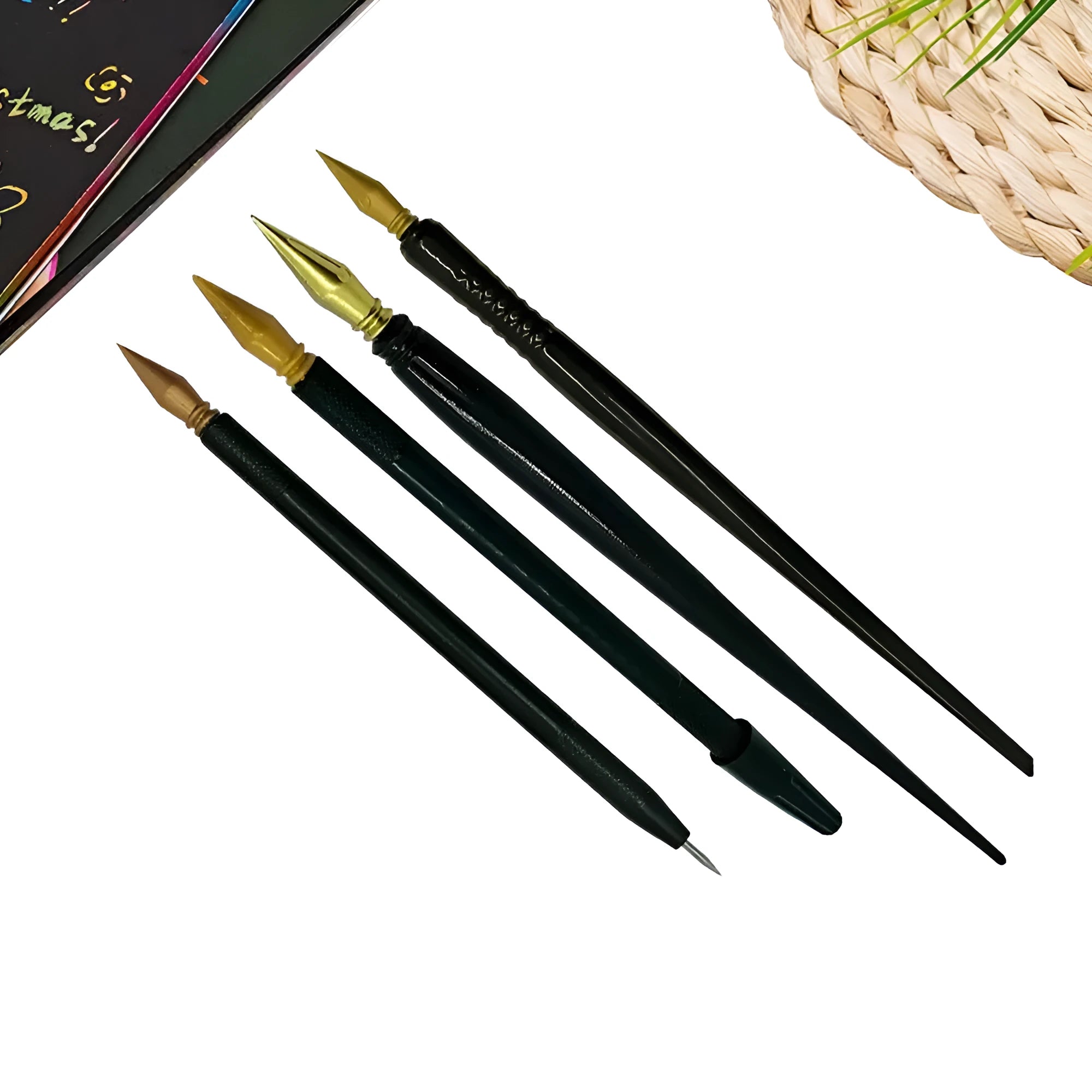 A white scratch pen tool for children's rainbow art and craft projects on a black surface.