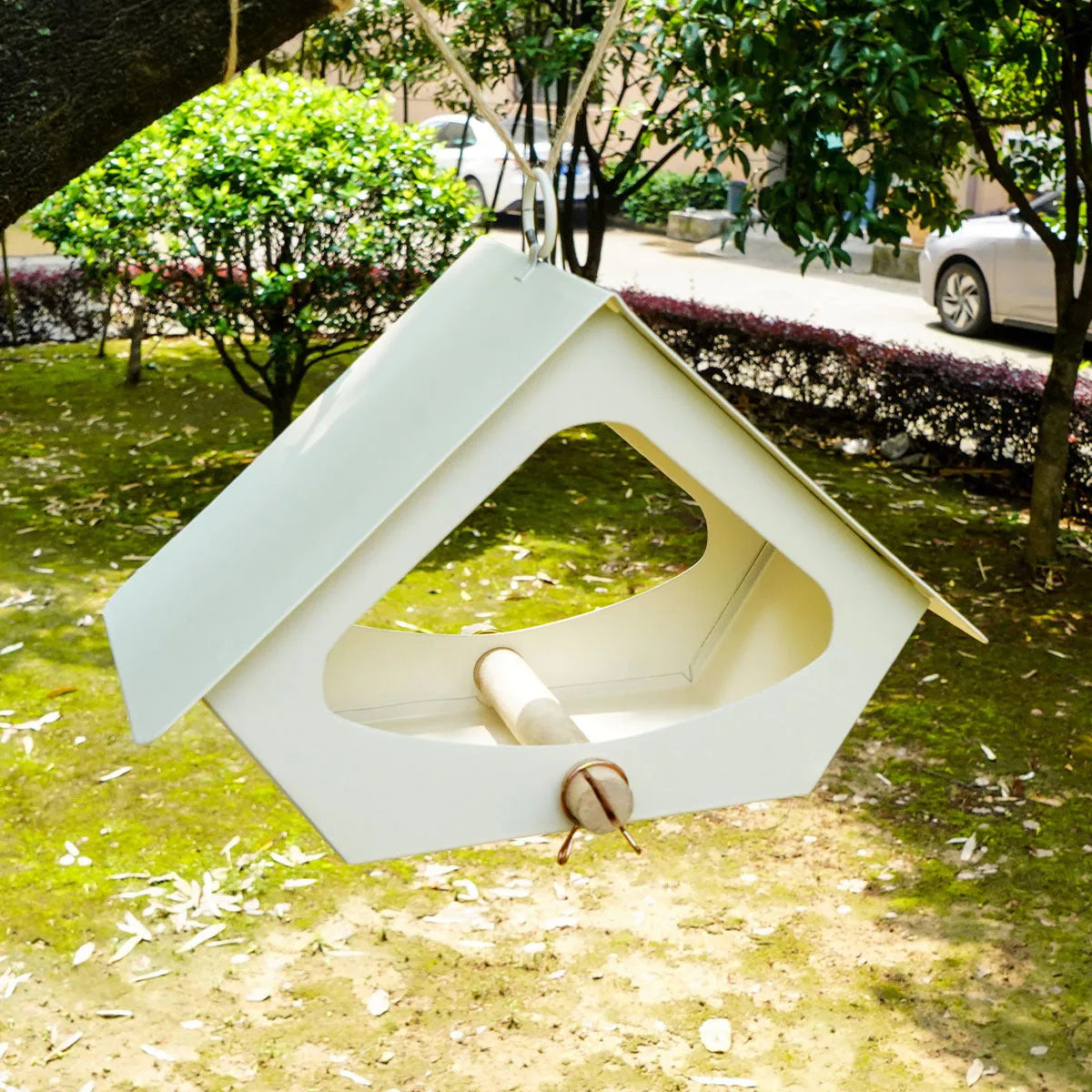 Simple modern iron bird nest feeder for outdoor garden decoration.