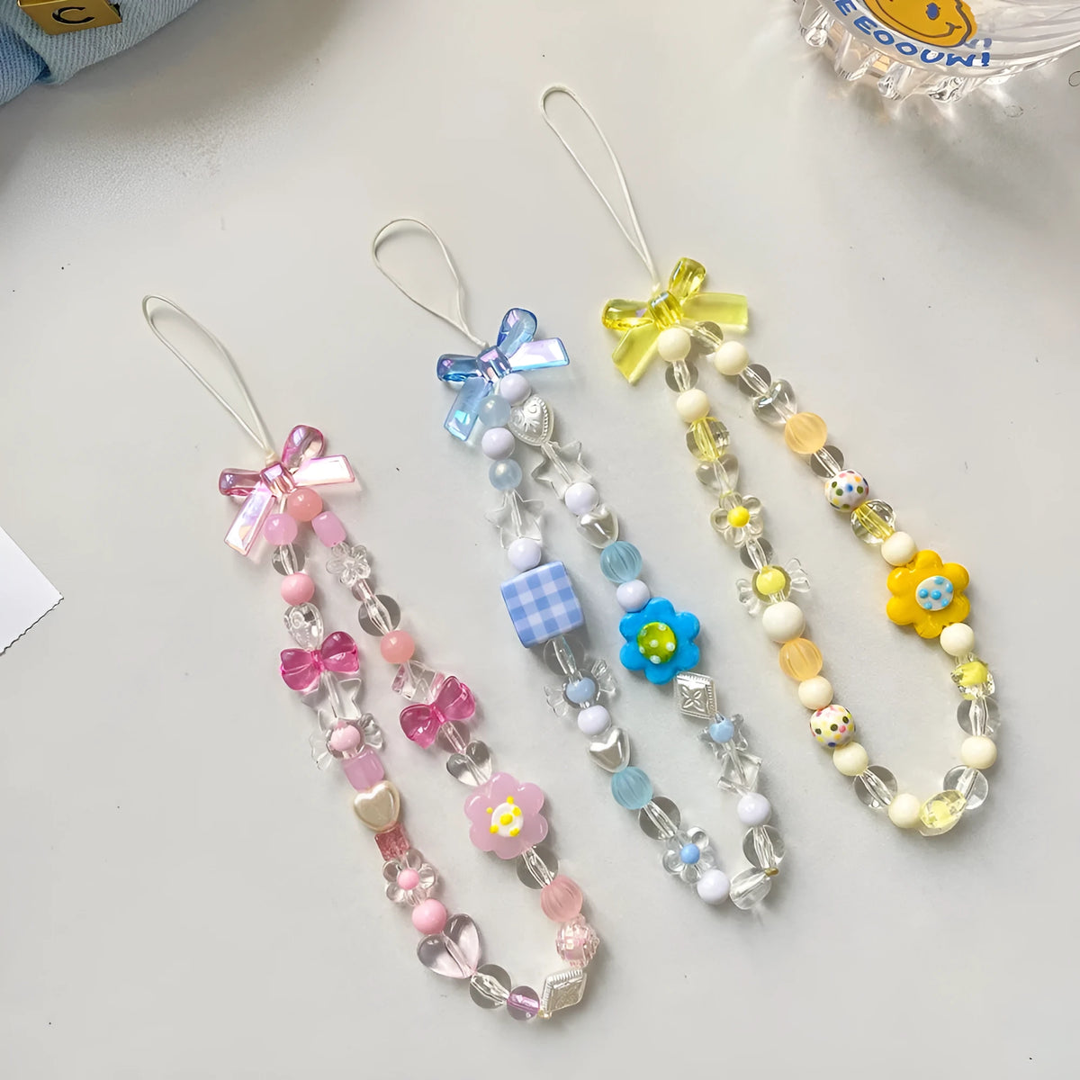 Colourful plastic resin beaded flower mobile phone lanyard with floral designs