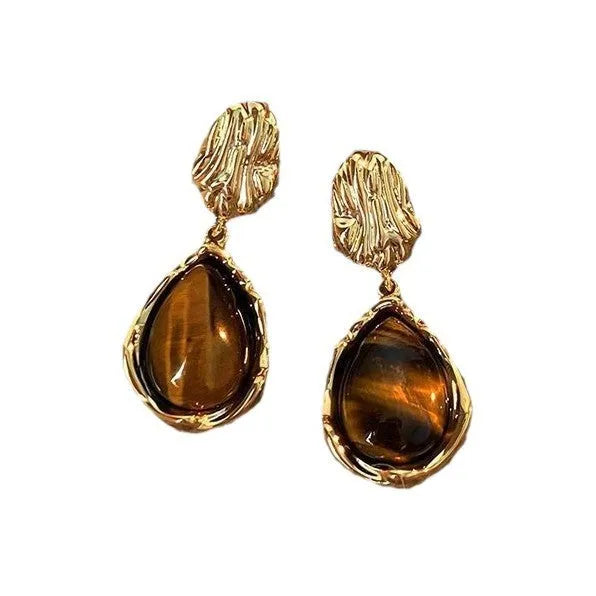 Handmade geometric tassel earrings in three electroplated styles: round piece, irregular, and water drop designs