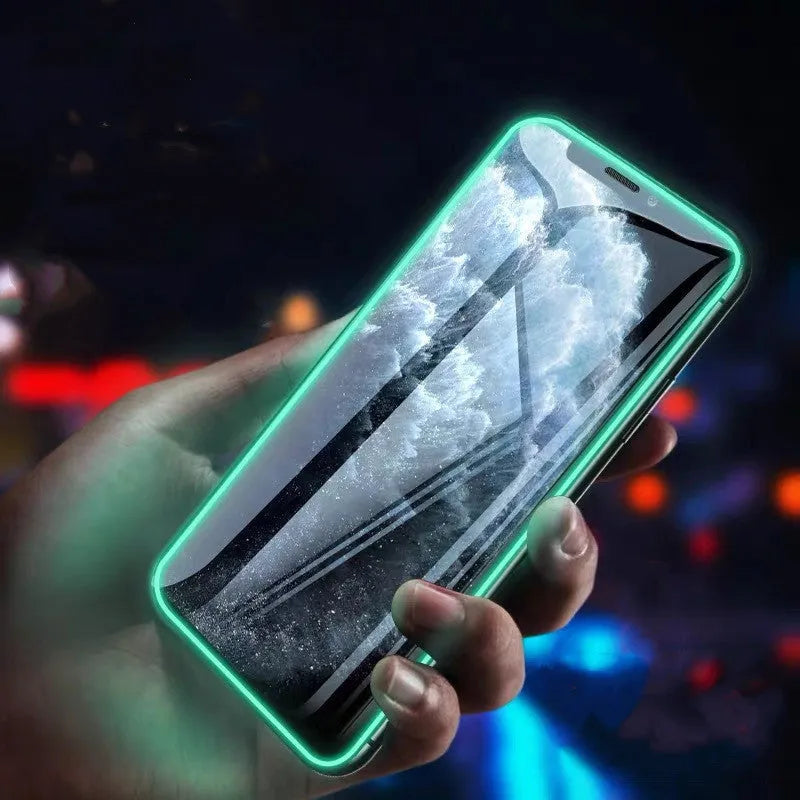 Luminous full cover tempered glass screen protector for iPhone showing glow effect in dark setting