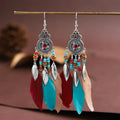 Retro feather drop earrings with leaf pattern in alloy material available in multiple colours