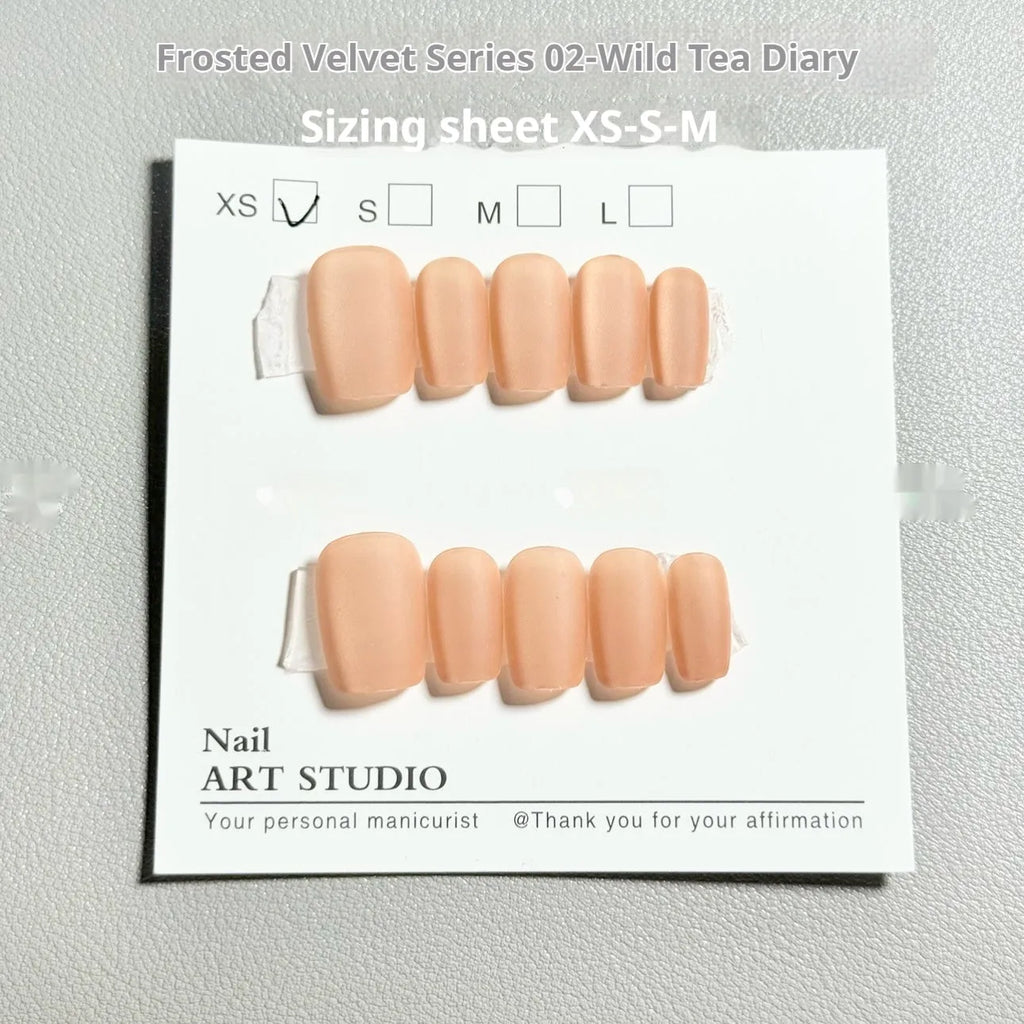 Frosted velvet finish false nails with aurora and cat's eye effects in short ladder sizes