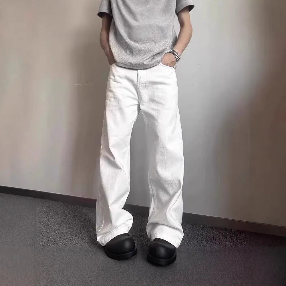Men's white straight leg jeans with wide leg opening and front zip fly