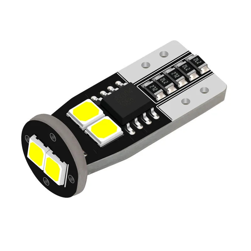 Small LED car licence plate reading light with fibreboard construction