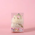 Beige and pink Princess crown veil headdress for a cat on a mannequin head.