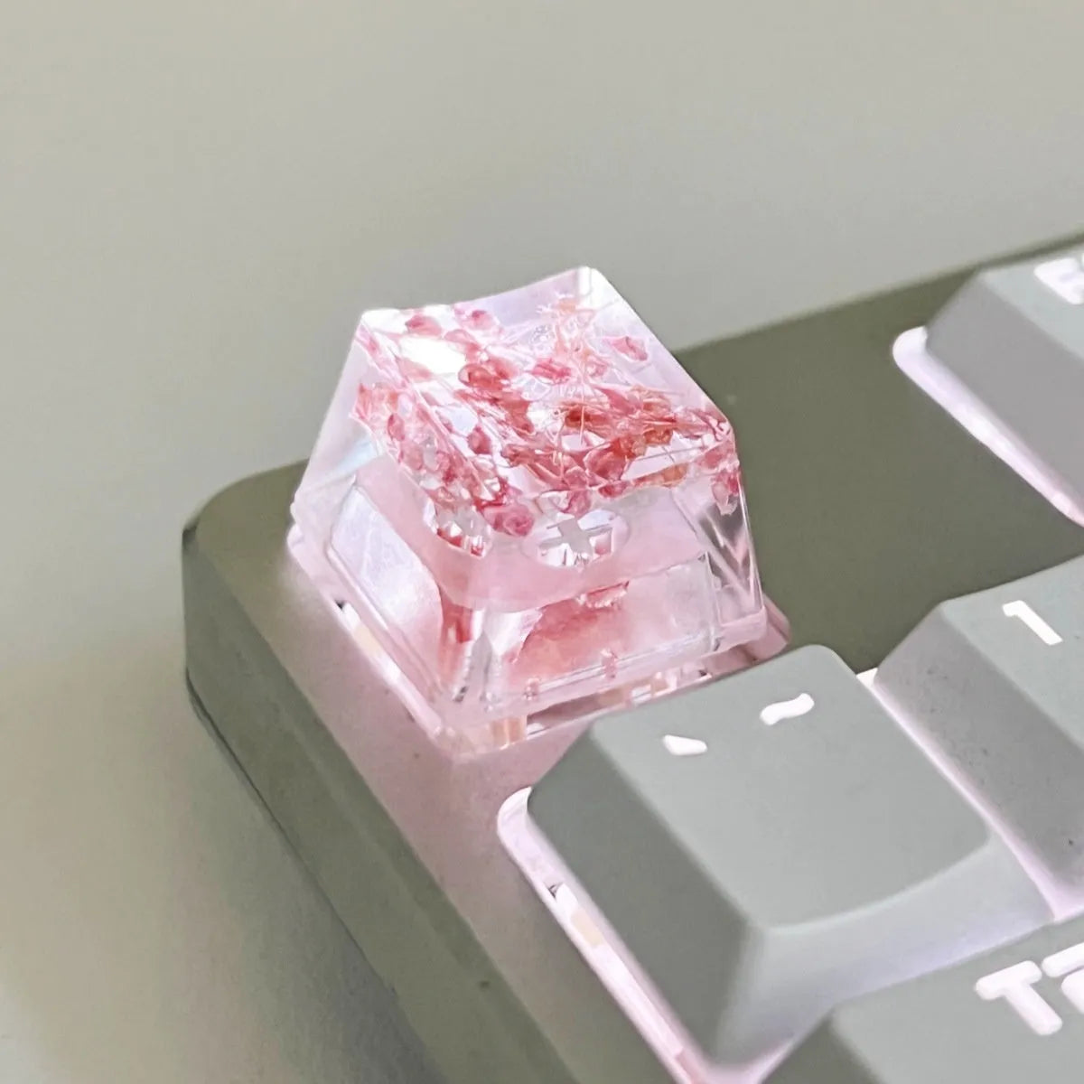 Transparent resin mechanical keyboard keycap with starry sky design in green colour