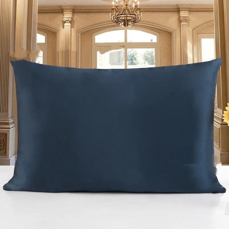 19 M double-sided silk pillowcase shown in apricot colour, lying flat to show envelope closure.