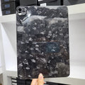 Carbon fibre hard case for Apple iPad Pro 11 showing embossed plaid pattern and matte finish.