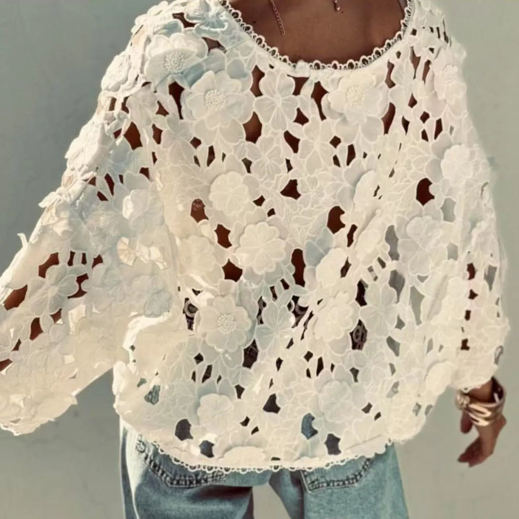 A loose-fit women's lace cardigan with a V-neck, long sleeves, and decorative 3D lace flowers, shown in khaki.