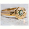 Gold zinc alloy ring with oval asterism zircon star and adjustable opening