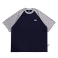 Men's blue loose-fit casual t-shirt with raglan sleeves on a hanger.