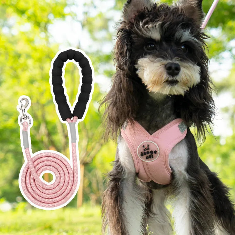 Polyester dog vest with attached hand-holding rope in blue, green, pink or yellow colours