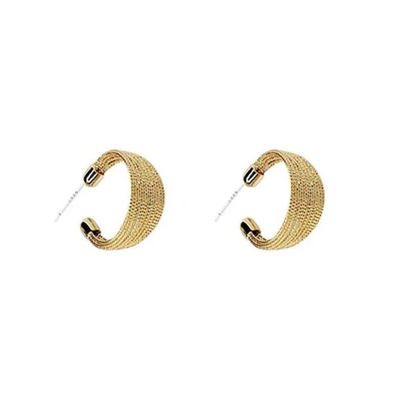 Geometric copper earrings in silver and gold finishes as clip-on and stud styles