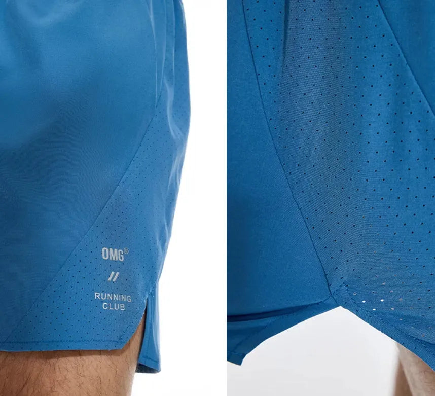 Men's black four-point stretch running shorts with laser-stitched seams on a grey background.