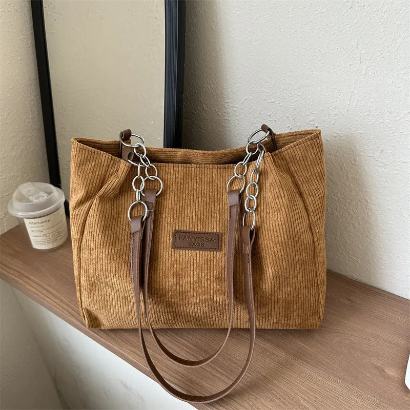 Corduroy one-shoulder tote handbag with three-dimensional pocket in street trend style