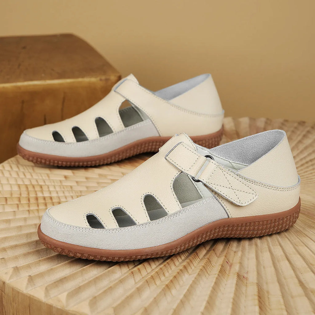 Women's white plus size flat heel sandals with hollow toe cap design and thick rubber sole