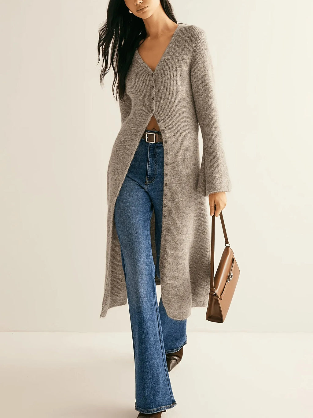 Khaki French style long sleeve cardigan coat with button front closure on mannequin