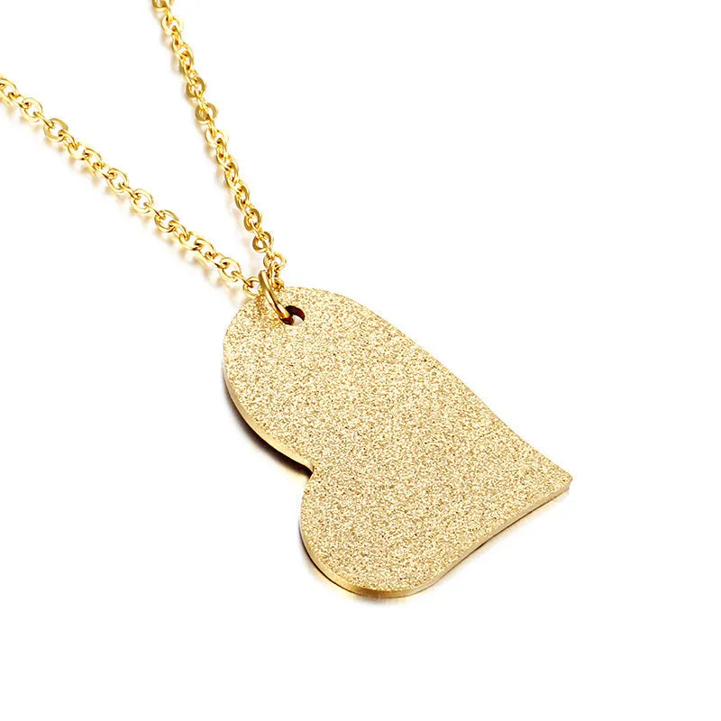 Women's titanium steel heart pendant necklace with geometric design elements