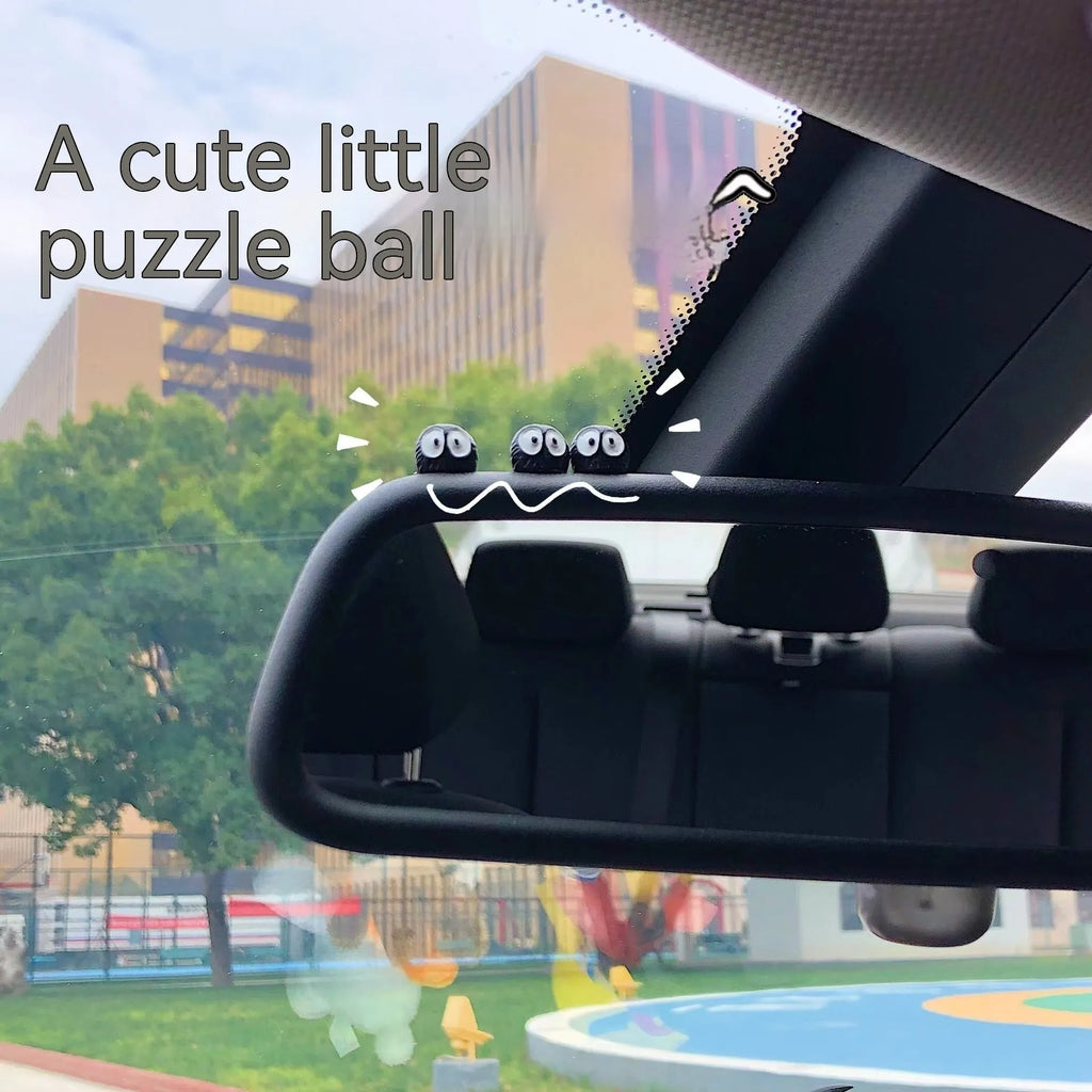 Small black resin briquette car dashboard decoration with cartoon coal ball design