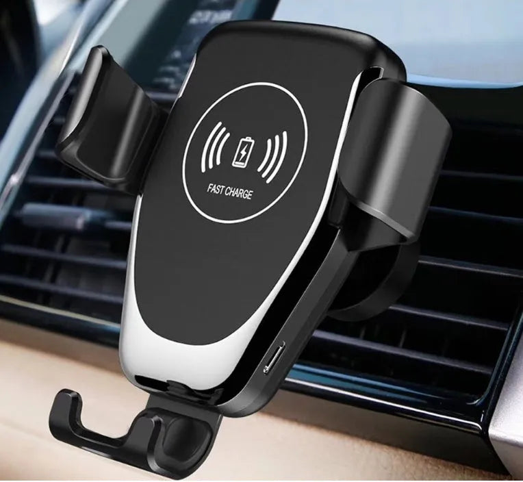 Black wireless car charger mounted on dashboard charging an iPhone