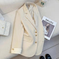 Korean style women's loose fit coat in milky white or black polyester with long sleeves and pockets