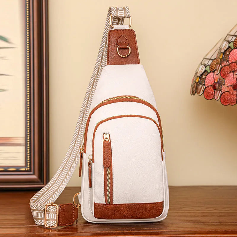 Women's soft PU chest bag in street trend style with zipper pockets and sewing thread details