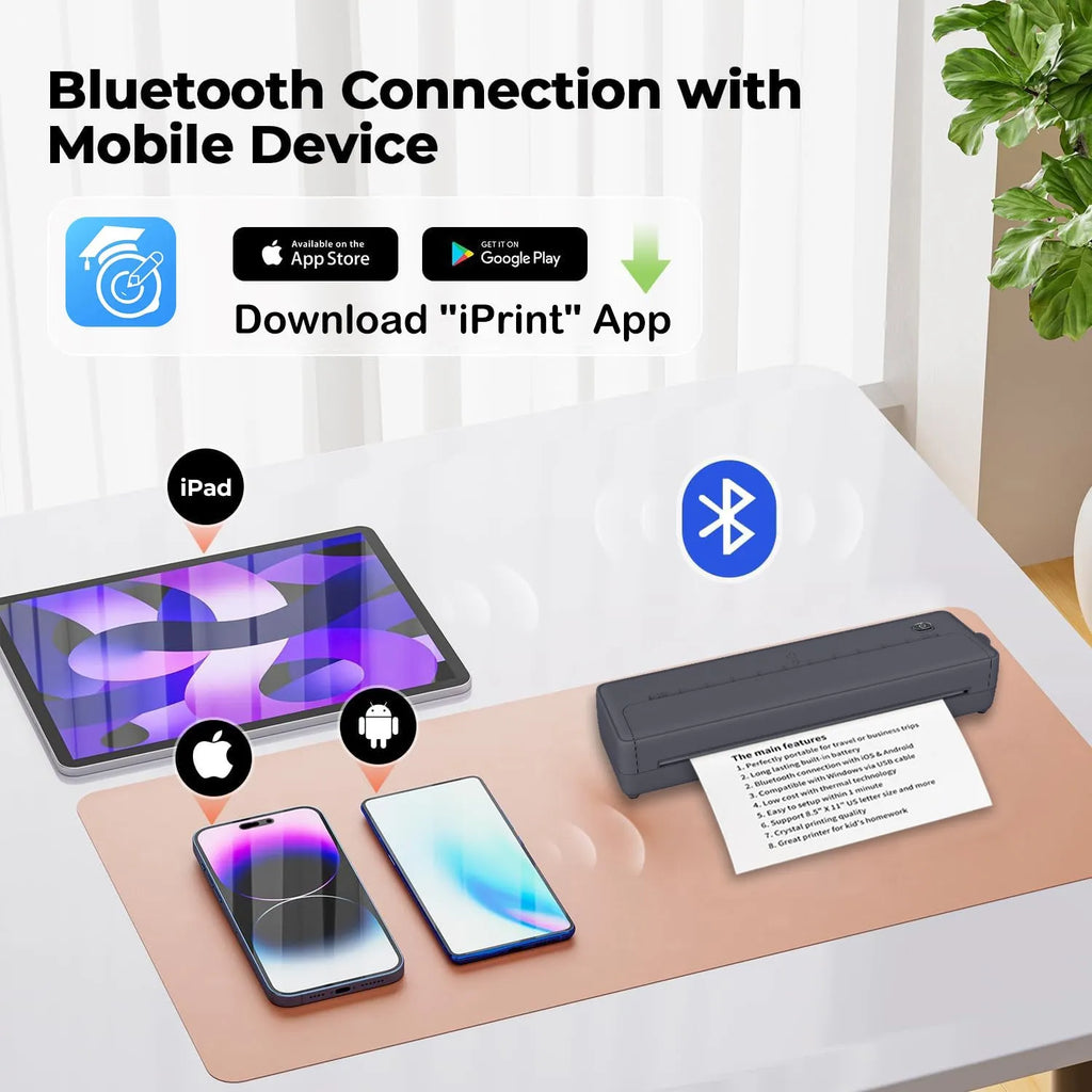 X8 black portable A4 Bluetooth printer on a desk next to a mobile phone.