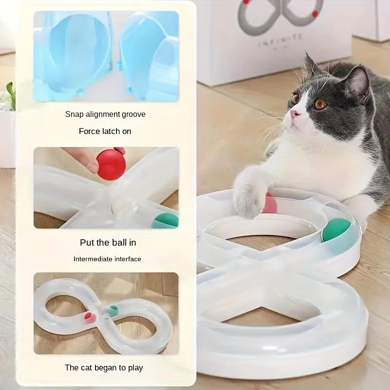 Blue and white cat turntable toy set with track balls and a feather teaser stick on a plain background.