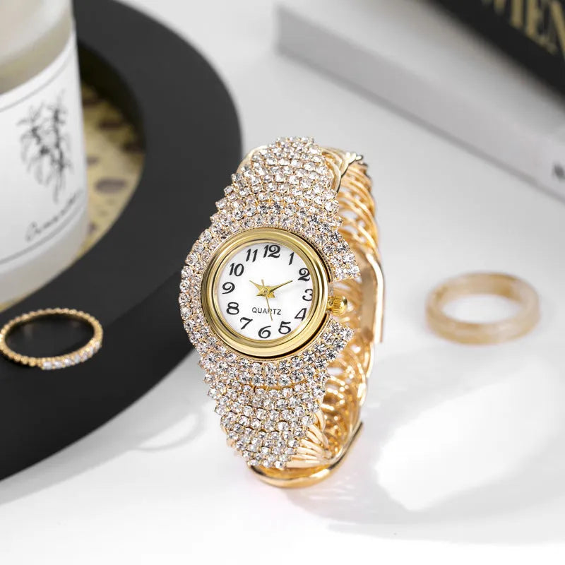 Women's 33mm quartz watch with circular dial, metal case, alloy strap, and open buckle