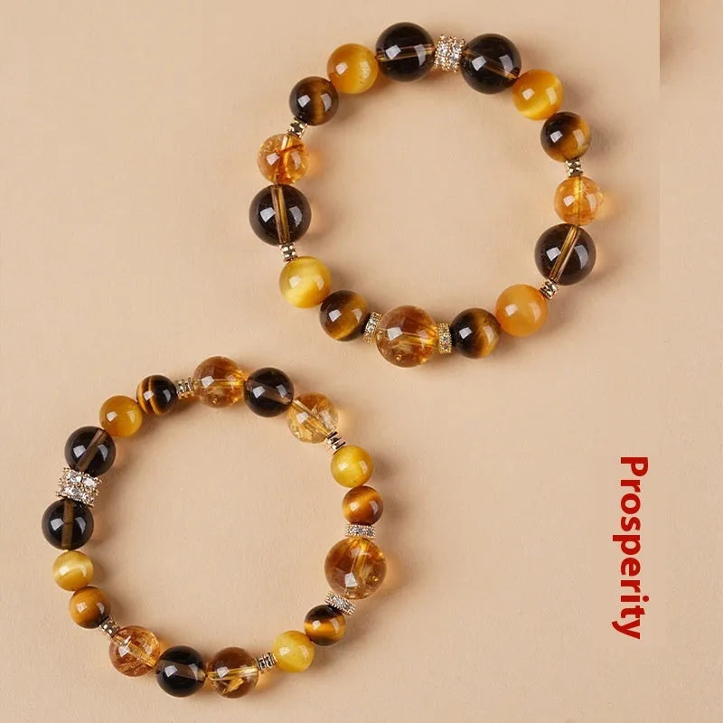 Lucky Jinba Tiger-eye crystal bracelet with yellow stone and geometric tower design