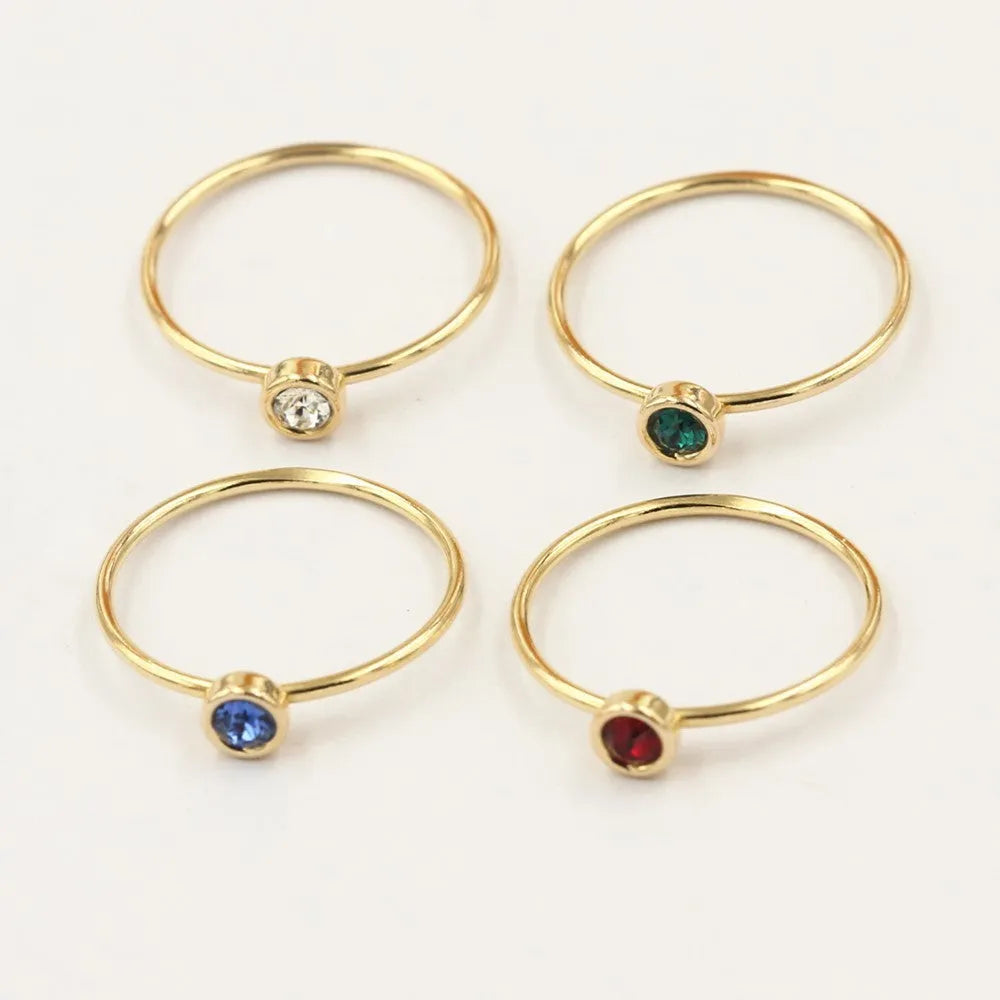 Women's copper knuckle ring with 14K gilded GF zircon DIY ornament accessories in green, blue, dark red, and white colour options.