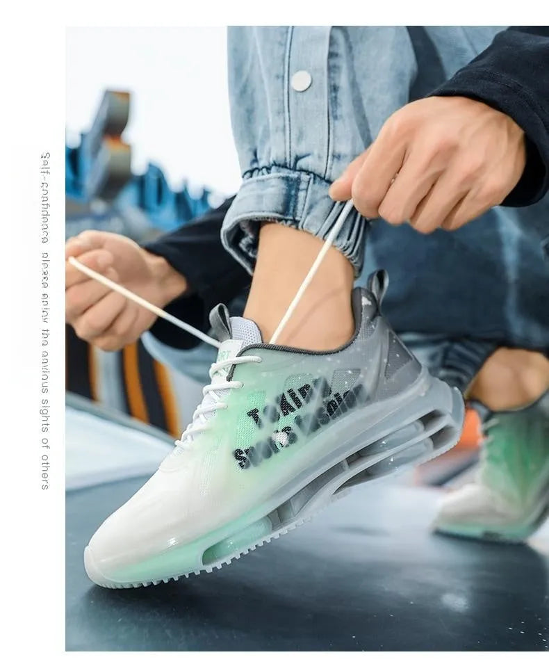 Men's black green and grey orange heightened platform casual running shoes with mesh upper and rubber sole.