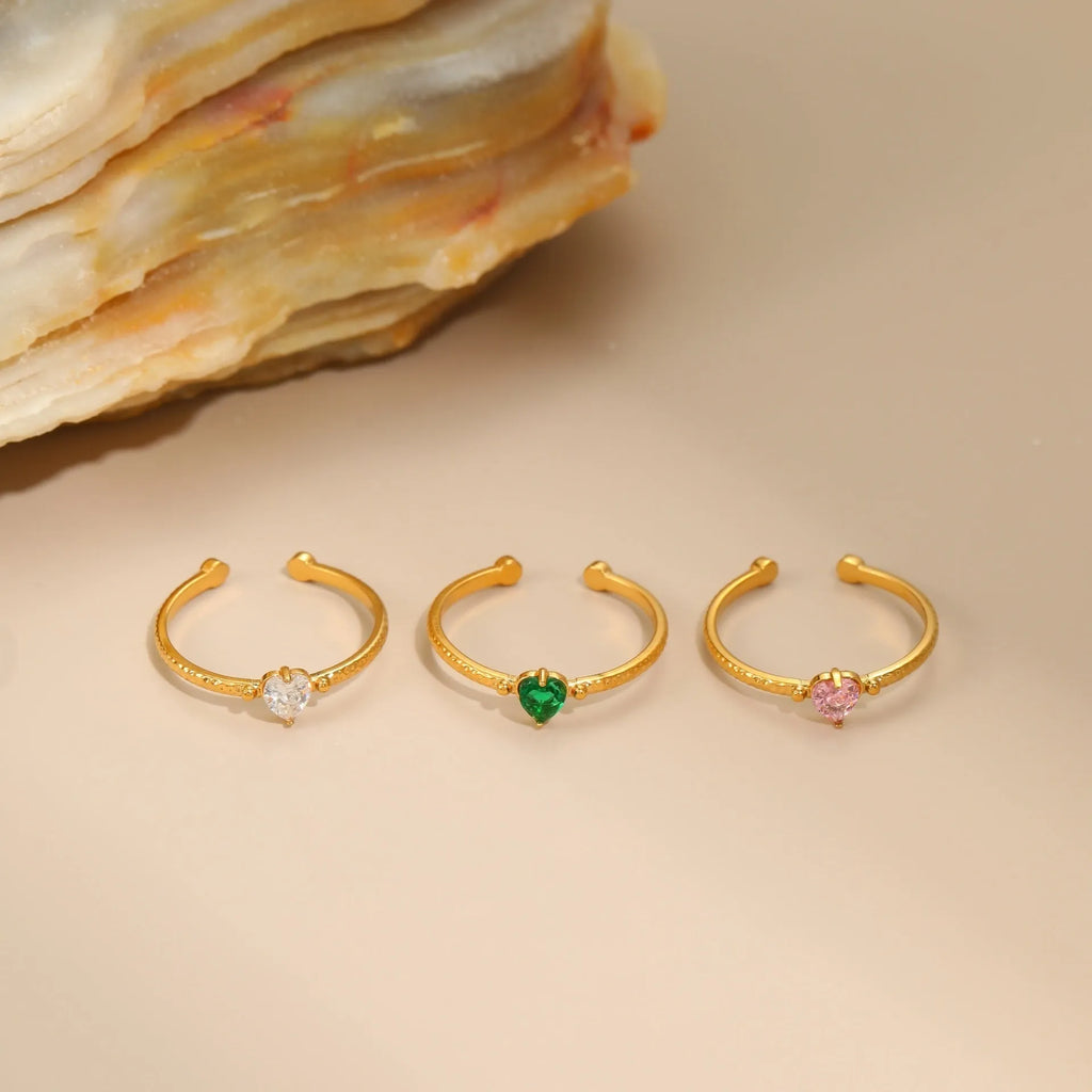 Open-ended heart-shaped ring with geometric design and zircon inlay in stainless steel