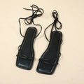 Women's flat sandals with ankle ring bandage detail and front lace-up closure in square-toe design
