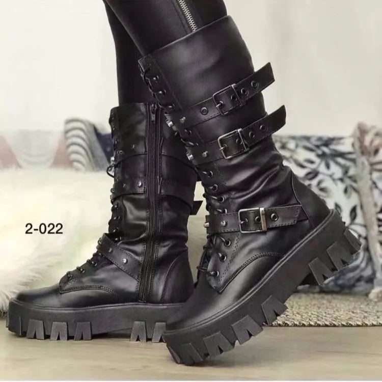 Women's black mid-calf knight boots with a metal buckle strap and side zipper on a round toe.
