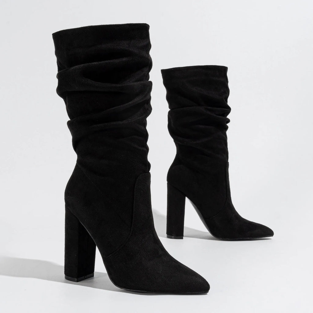 Women's black suede chunky heel pointed toe pull-on boots with mid-calf shaft.