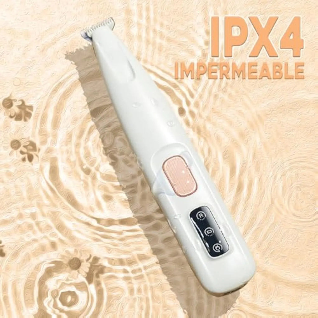 White electric dog paw trimmer with LED light showing compact design and grooming blades