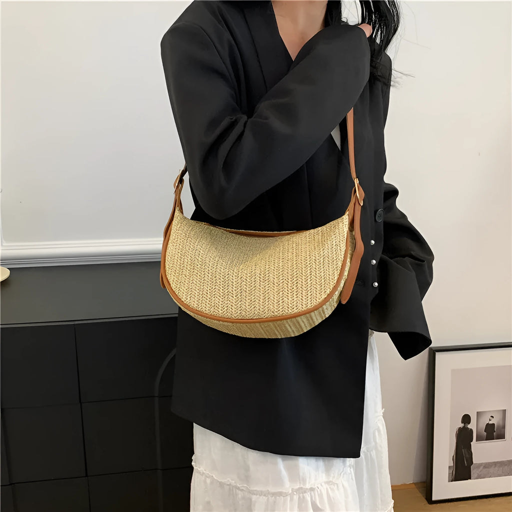 Women's knitted straw woven crossbody bag with single strap in corrugated black or khaki holding phone and files