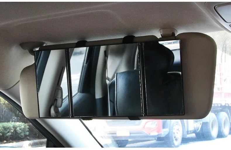 Silver car folding makeup mirror shown open and closed on a car visor