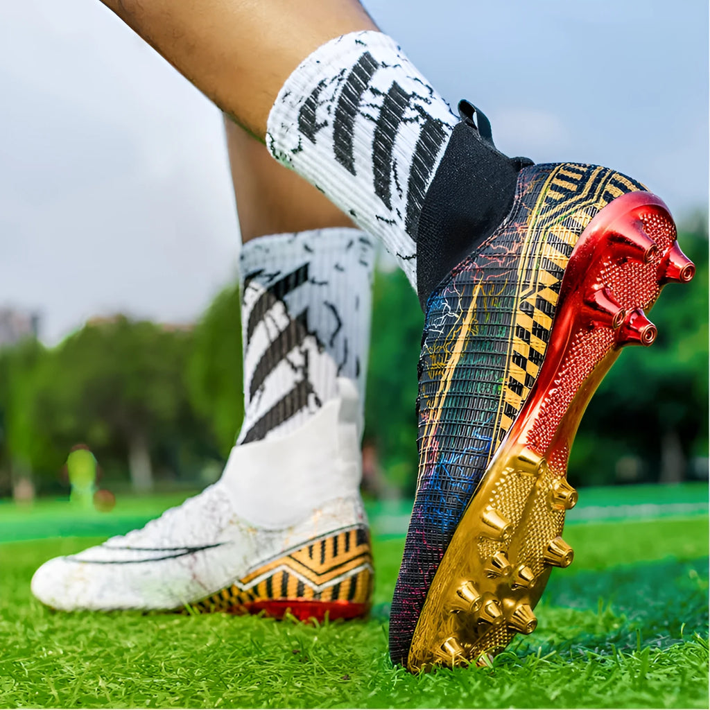 High-top soccer training shoes with gold plated bottom detail in synthetic leather and mesh construction