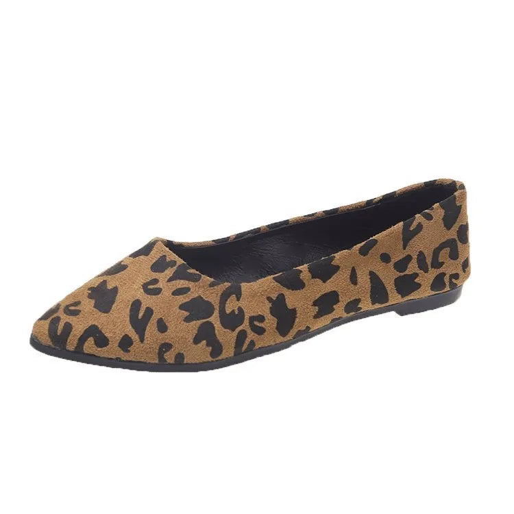 Women's leopard print flat pointed toe pumps with low heel on beige background