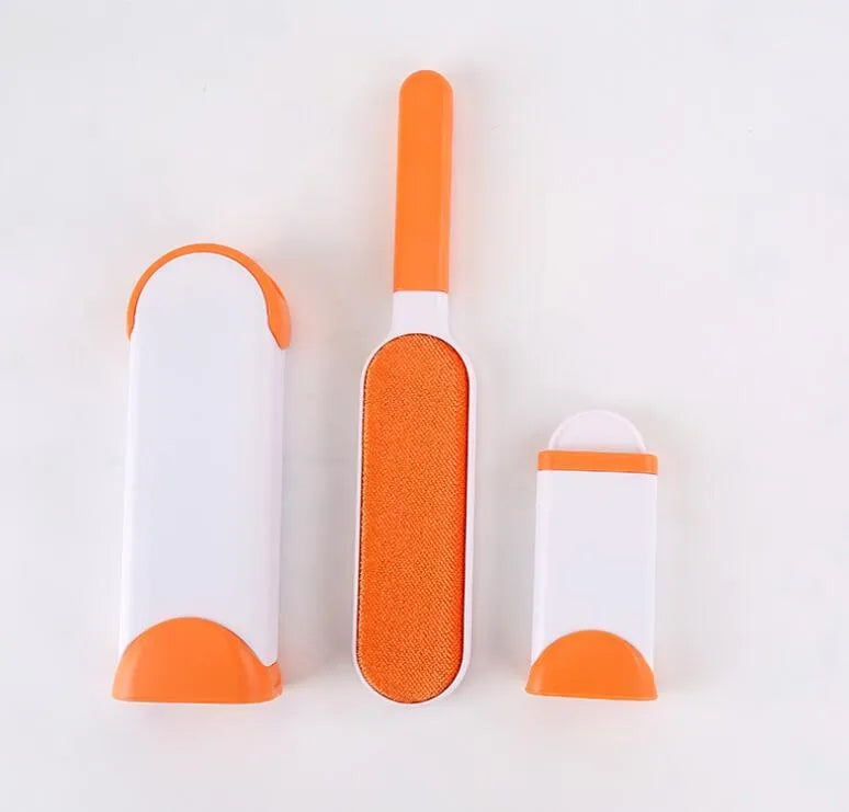 Blue reusable pet hair brush with self-cleaning base for sofas and furniture.