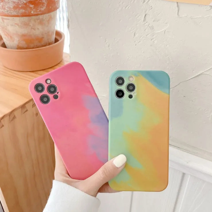 Soft silicone phone case with oil painting gradient geometry abstract design in blue, green, pink, or purple for iPhone.